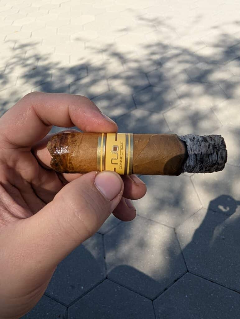 NUB Connecticut 354 held over table